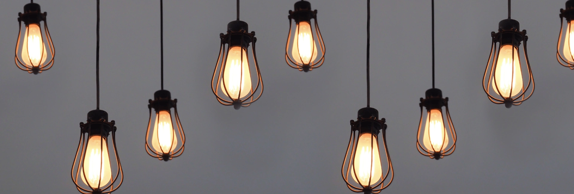 multiple light bulbs in gray background tab bg